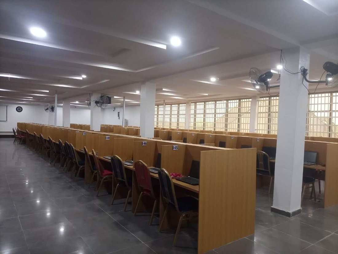Wide view of the Beloved Infotech CBT hall with numbered cubicles